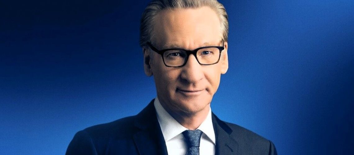 Bill Maher wearing glasses and dark suit in a portrait photo for Real Time With Bill Maher season 24