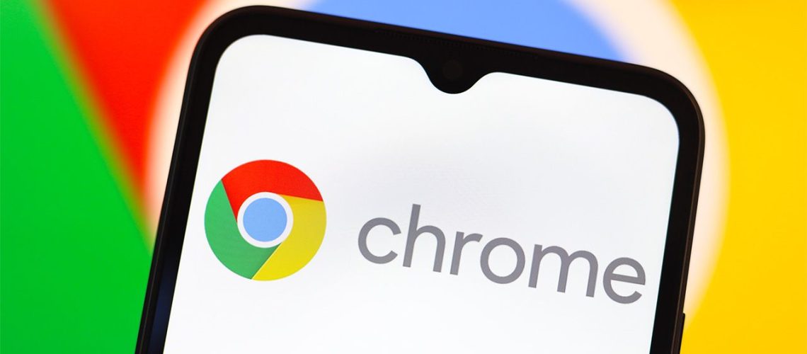 Google Chrome logo displayed on smartphone screen, with larger logo behind