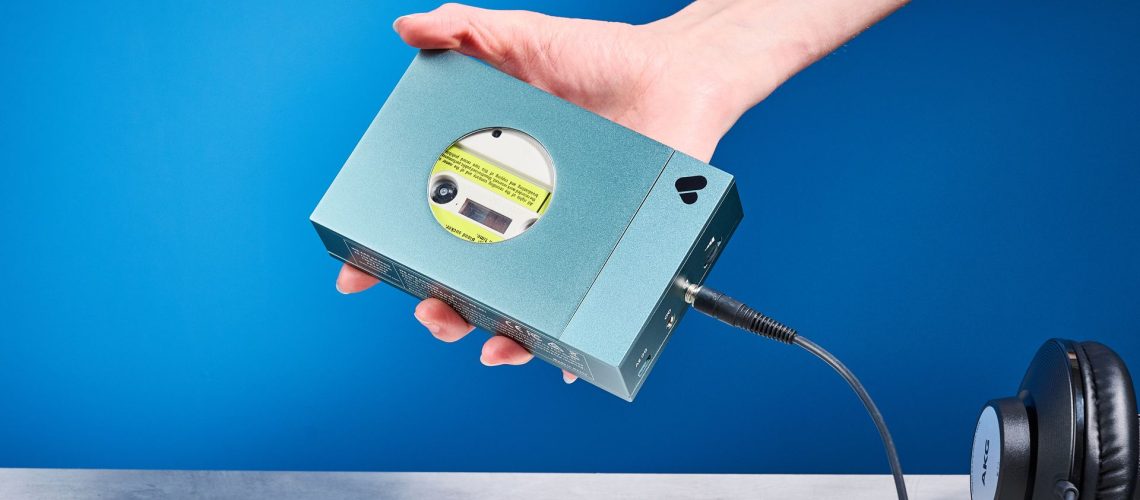 We Are Rewind Cassette Player in blue photographed in front of a blue background