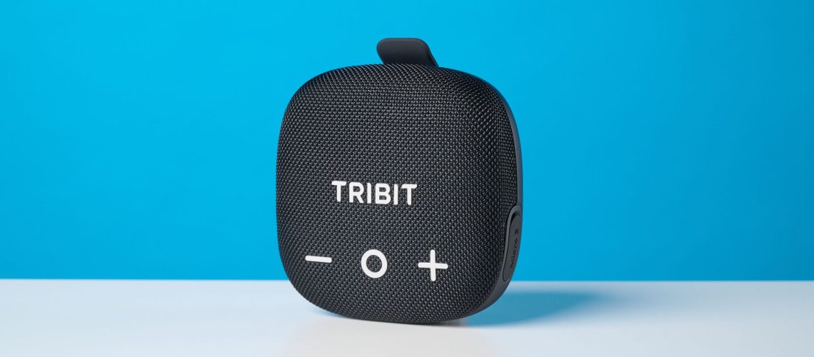 Tribit StormBox Micro 3 in black photographed in front of a blue background