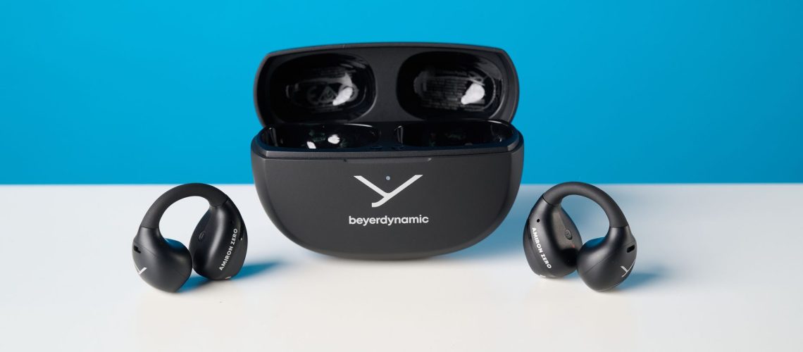 Beyerdynamic Amiron ZERO open-earbuds photographed on a blue background