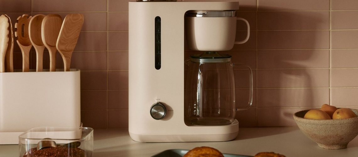 The Caraway 10-Cup Coffee Maker in a home