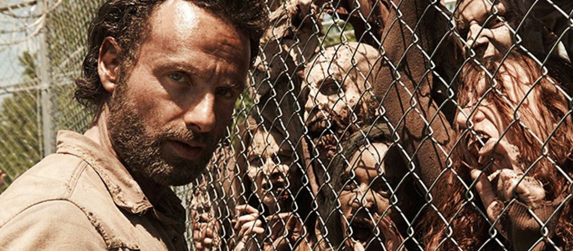 Andrew Lincoln and zombies in The Walking Dead
