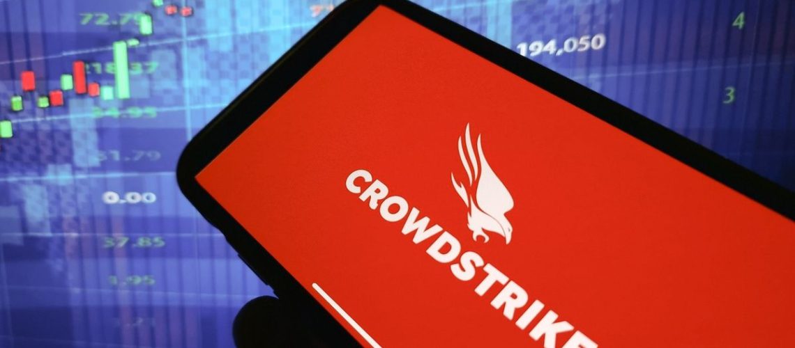 crowdstrike red logo on a smartphone in front of a blue background