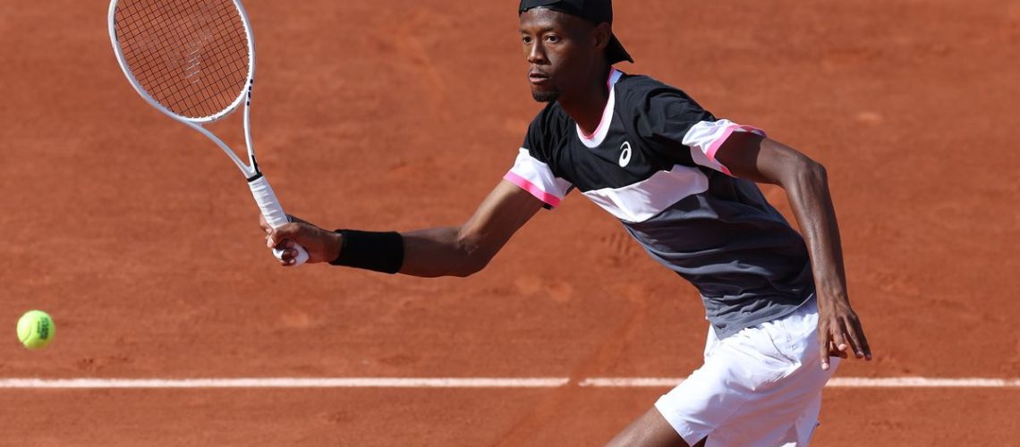 Christopher Eubanks plays a shot at the French Open