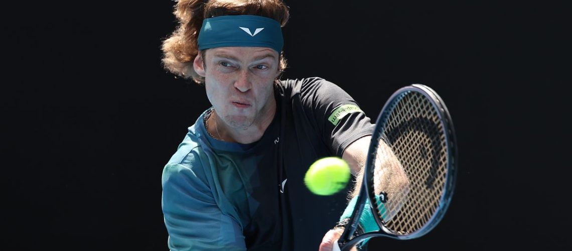Andrey Rublev plays a backhand in the Australian Open 2024 ahead of the Eubanks vs Rublev live stream