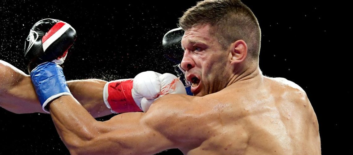 Sergiy Derevyanchenko takes a punch ahead of the 2024 M