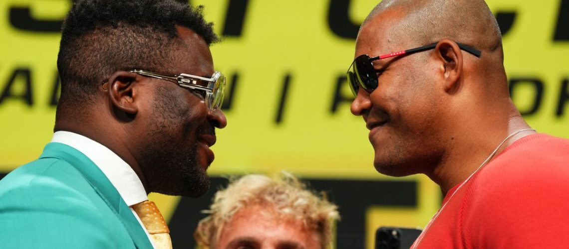 Francis Ngannou faces off with Renan Ferreira ahead of their fight.