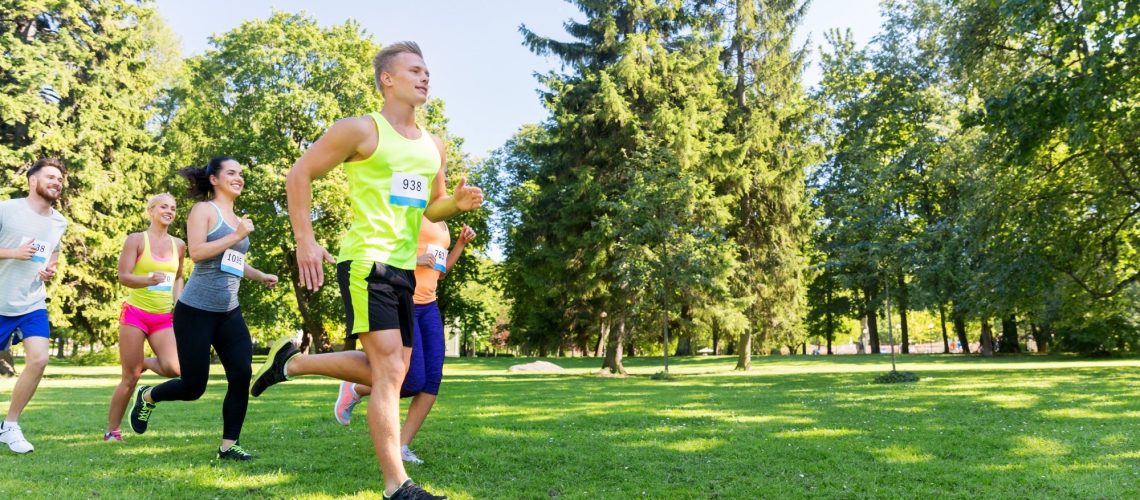 group of happy people running