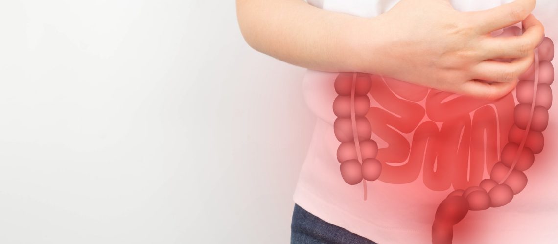 Woman suffering from abdominal pain with small and large intestines organ shape.