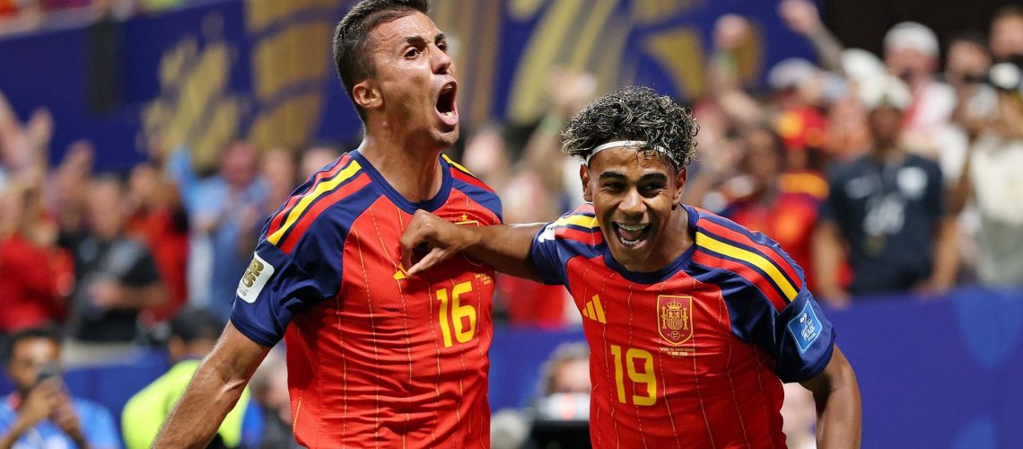 Lamine Yamof Spain celebrates with teammate Rodri after scoring his team's first goal during the FIFA World Cup 2026 Group H match between Spain and Saudi Arabia.