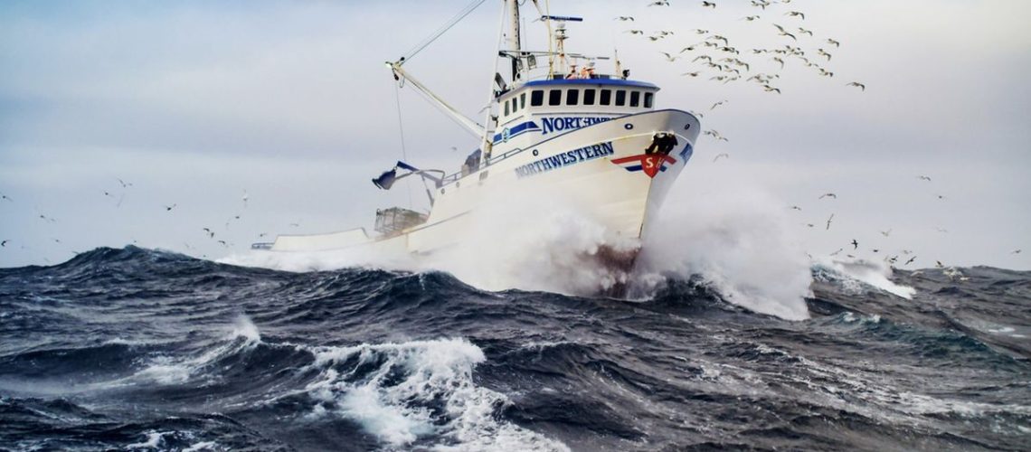 Fishing vessel the F/V Northwestern cuts through rough seas in