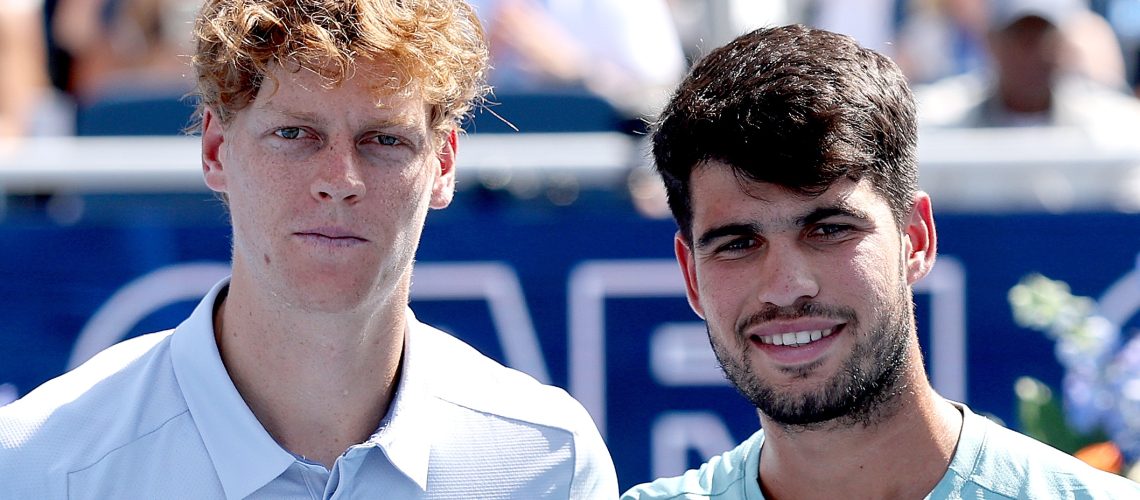 MASON, OHIO - AUGUST 18: Jannik Sinner of Italy and Carlos Alcaraz of Spain pose with their Rookwood Cups after the men's final of the Cincinnati Open ahead of the US Open Men's Final 2025 at Flushing Meadows, NY. (Photo by Matthew Stockman/Getty Images)