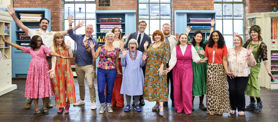 Esme Young, Patrick Grant and Sophie Willan flanked by The Great British Sewing Bee 2026 contestants
