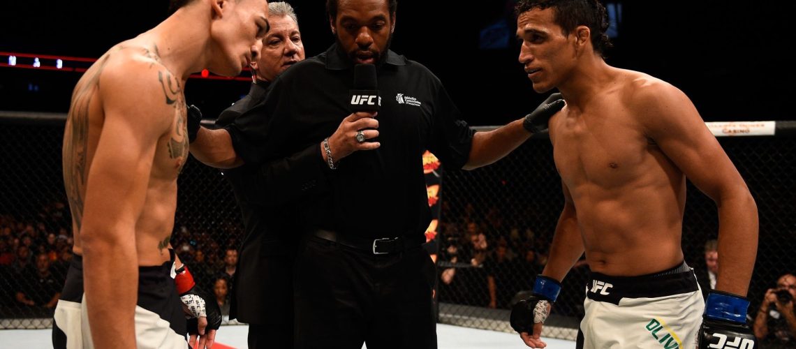 Max Holloway and Charles Oliveira facing off in 2015
