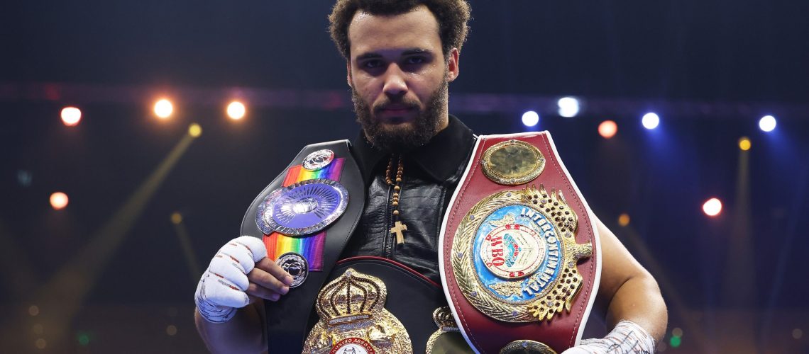 Moses Itauma celebrates victory with his belts following the WBO Inter-Continental, WBA International and Commonwealth Silver Heavyweight titles' fight between Moses Itauma and Demsey McKean as part of Oleksandr Usyk v Tyson Fury 2, Reignited card at Kingdom Arena on December 21, 2024 in Riyadh, Saudi Arabia.