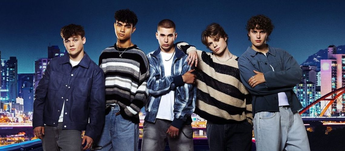 Dear Alice boyband members James, Blaise, Reese, Dexter and Olly pose in front of the Seoul skyline in Made in Korea: The K-Pop Experience