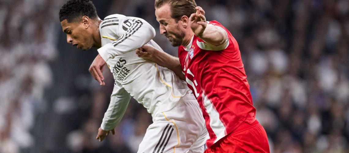 England teammates Jude Bellingham and Harry Kane battling for the ball during a Bayern Munich vs Real Madrid game