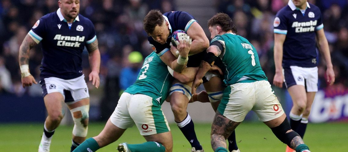 Jack Dempsey of Scotland is tackled by Andrew Porter and Ronan Kelleher of Ireland during Six Nations match between Scotland and Ireland.