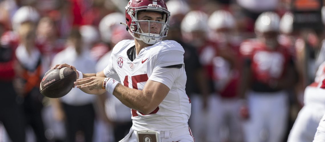 Alabama Crimson Tide quarterback Ty Simpson (15) drops back to throw a pass durning a college football game between the Alabama Crimson Tide and the Wisconsin Badgers on September 14th, 2024 at Barry Alvarez field inside Camp Randall Stadium in Madison, WI.