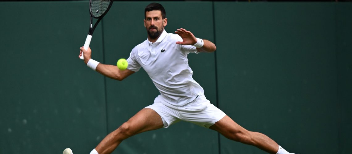 Novak Djokovic reaches for a shot playing at Wimbledon 2025