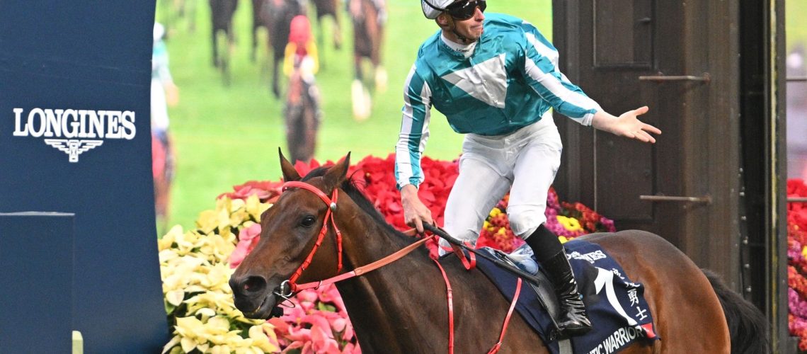 James McDonald riding Romantic Warrior during the Hong Kong Cup horse race.