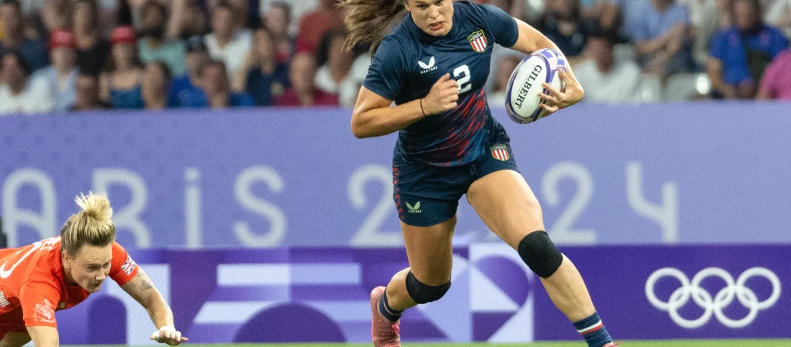 Ilona Maher #2 of the United States Women's National Team carries the ball during a women's Medal Quarter Final match between Great Britain and USA on day three of the Olympic Games Paris 2024 at Stade de France on July 29, 2024 in Paris, France.