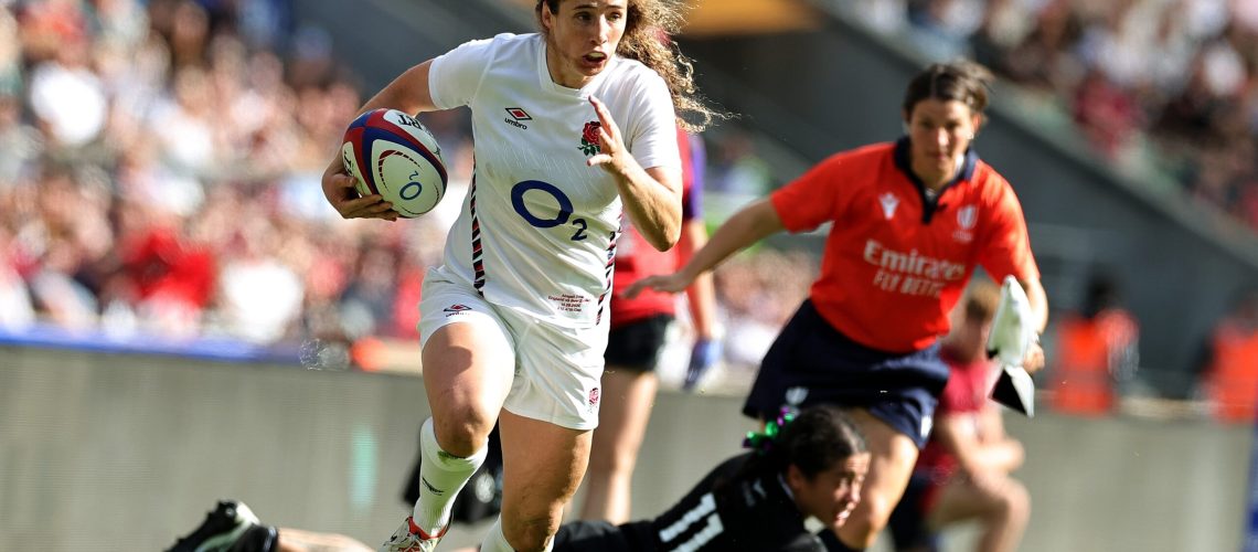 Abby Dow of England breaks clear of Katelyn Vahaakolo to score their second try during the Women's International match between England Red Roses and New Zealand Black Ferns at Allianz Twickenham Stadium on September 14, 2024 in London, England.