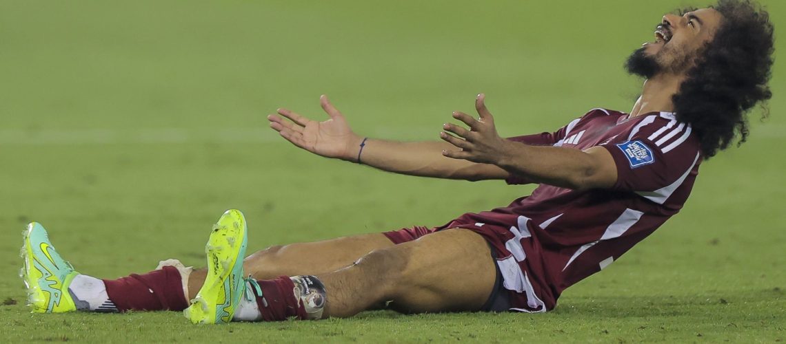 Akram Afif celebrating Qatar's 2026 World Cup qualification