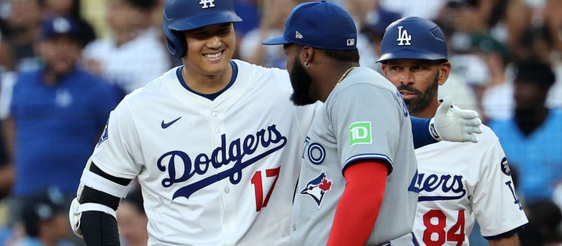 MLB World Series opponents Shohei Ohtani and Vladimir Guerrero Jr. in conversation during a recent Blue Jays vs Dodgers game