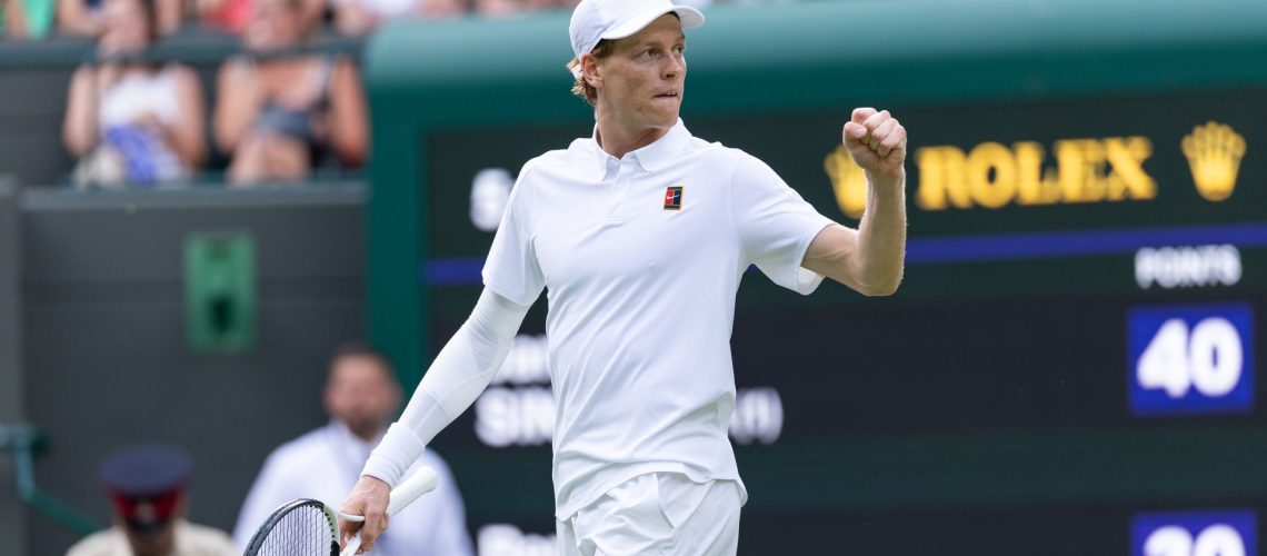 Jannik Sinner of Italy celebrates winning a point during a men's singles match at the All England Lawn and Tennis Club at Wimbledon in London, England.