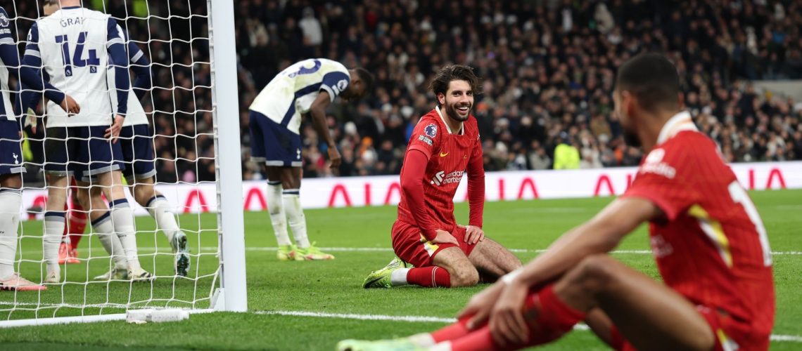 Dominik Szoboszlai laughing with Cody Gakpo during a recent Tottenham vs Liverpool game