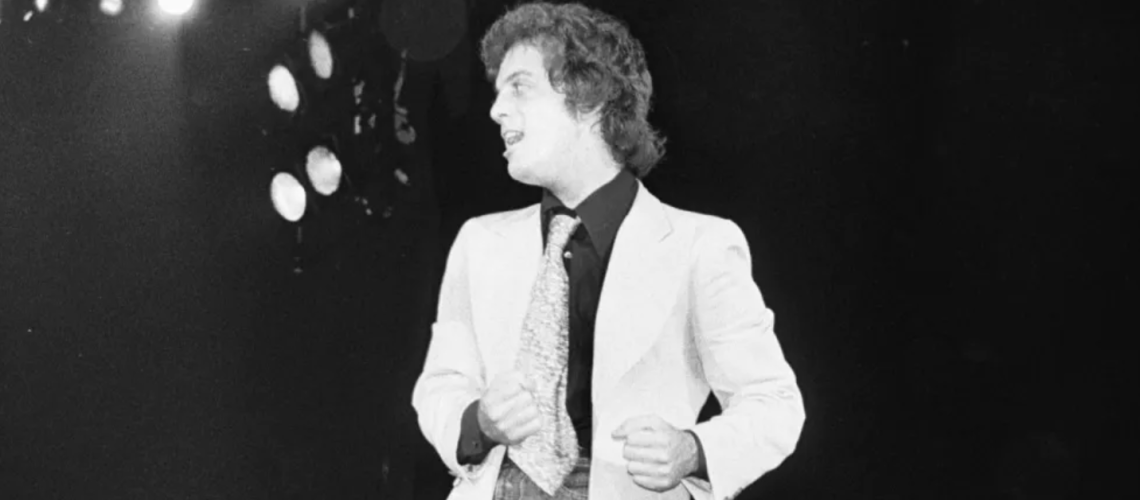 Billy Joel looks back on the key moments in his life in "Billy Joel: And So It Goes" - crimes against fashion not necessarily included