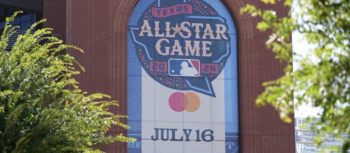 A general view of signage promoting the 2024 MLB All Star Game is shown outside the ballpark before the game between the Texas Rangers and the San Diego Padres at Globe Life Field on July 02, 2024 in Arlington, Texas.