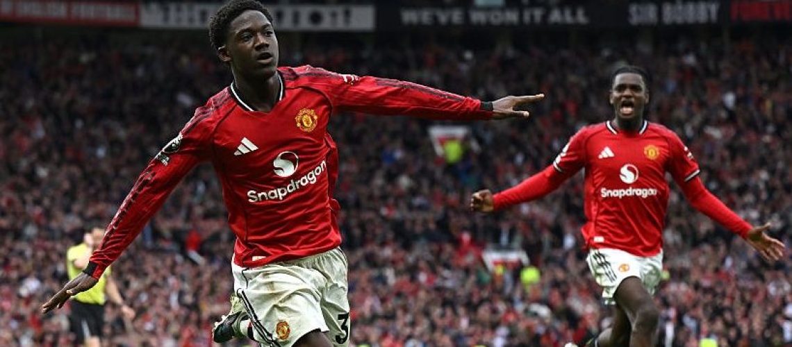Kobbie Mainoo of Manchester United celebrates after scoring his team's third goal during the Premier League match between Manchester United and Liverpool at Old Trafford.