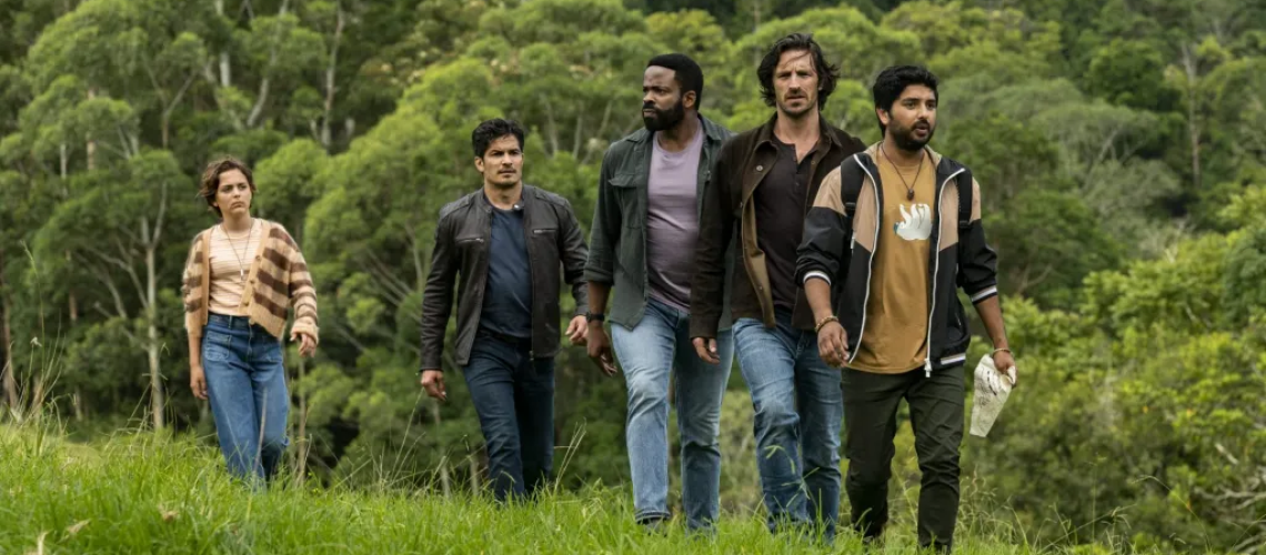 Lily, Levi, Ty, Gavin, and Scott exploring prehistoric L.A. in La Brea season 3.