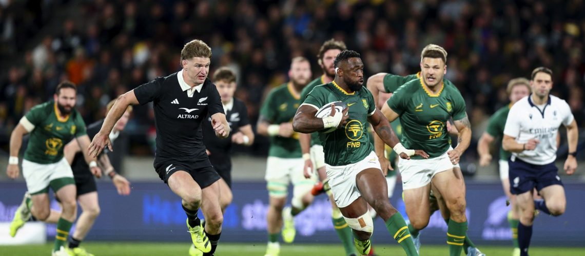 Siya Kolisi of South Africa makes a break during a rugby match against the New Zealand All Blacks.