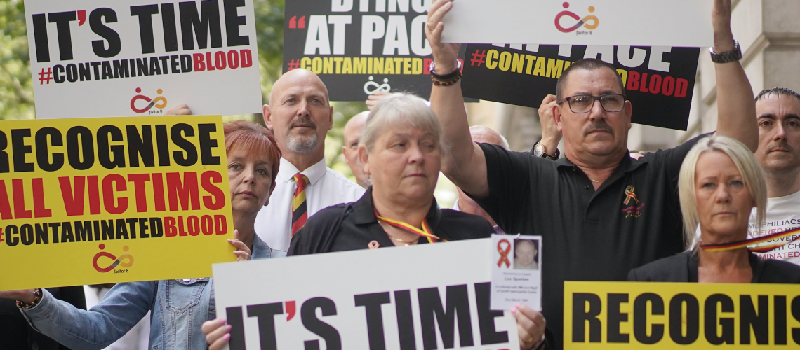 Campaigners on the streets reflecting issues raised in "The British Blood Scandal: Poisoned at School"