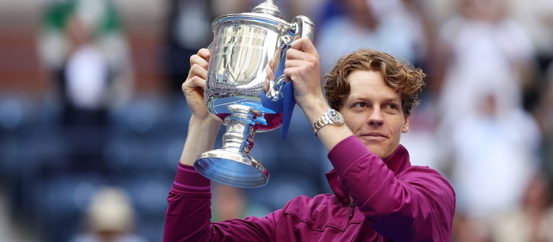Jannik Sinner of Italy celebrates with the winners trophy after defeating Taylor Fritz of the United States to win the Men's Singles Final on Day Fourteen of the 2024 US Open at USTA Billie Jean King National Tennis Center on September 08, 2024 in the Flushing neighborhood of the Queens borough of New York City.