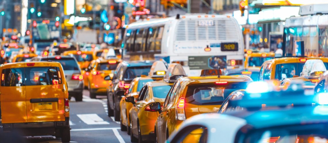 Urban jungle scene with cars and traffic in New York city