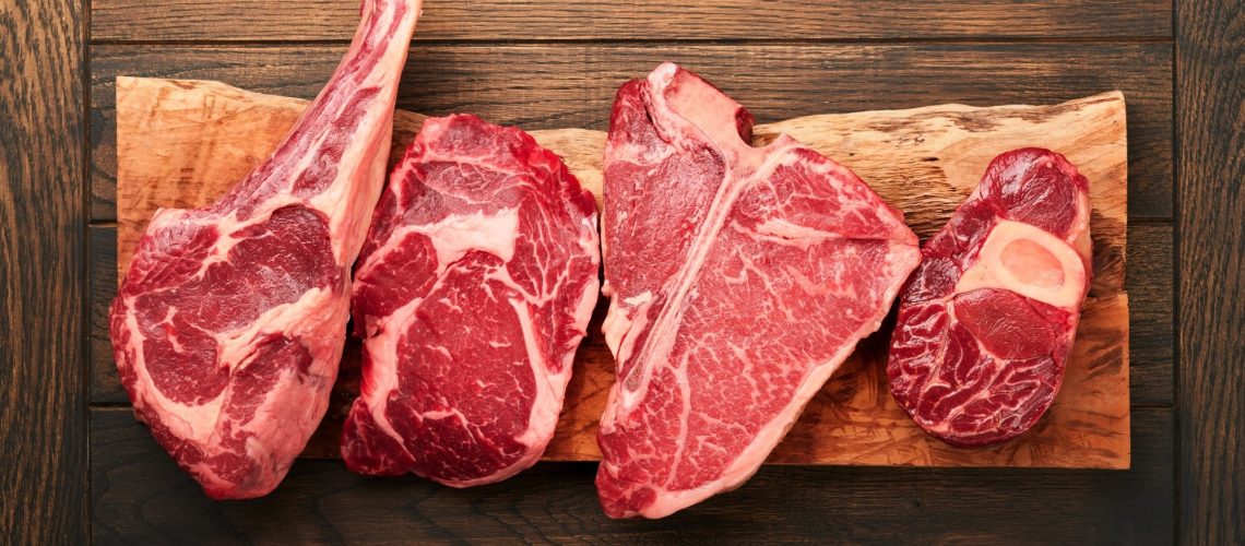 Raw prime steaks.