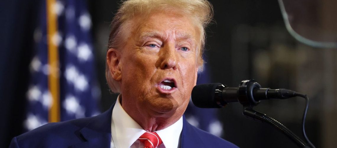 Republican presidential candidate former President Donald Trump speaks to guests during a rally at Clinton Middle School on January 06, 2024 in Clinton, Iowa. Iowa Republicans will be the first to select their party