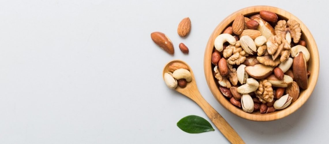 Study: Effects of energy-restricted diets with or without nuts on weight, body composition and glycaemic control in adults: a scoping review. Image Credit: SNeG17/Shutterstock.com