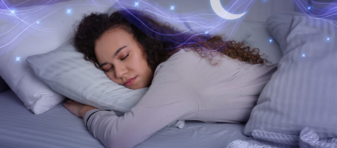 Woman sleeping in bed