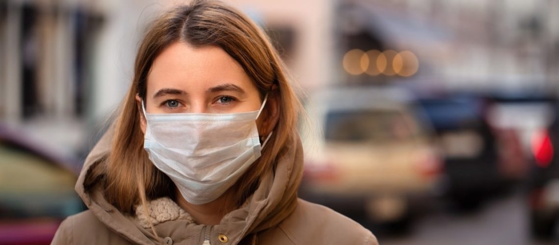 Study: Personal protective effect of wearing surgical face masks in public spaces on self-reported respiratory symptoms in adults: pragmatic randomised superiority trial. Image Credit: eugenegur/Shutterstock.com