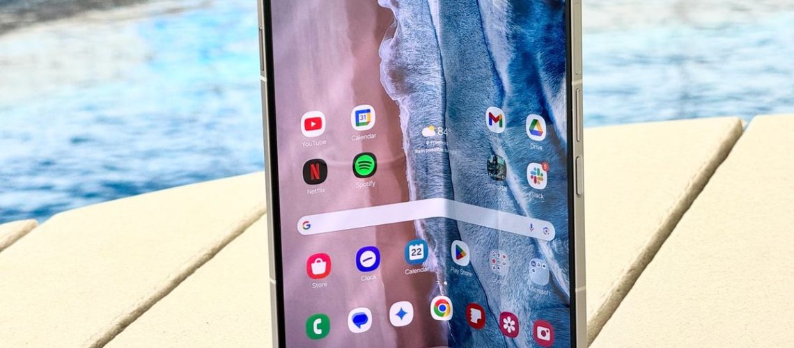 Samsung Galaxy Z Fold 6 on a table next to a pool