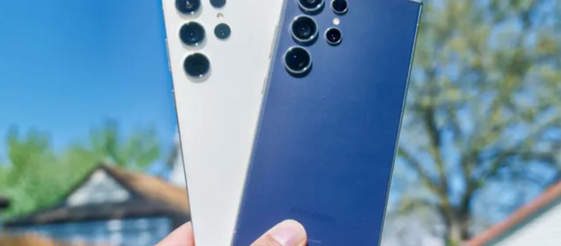 Samsung Galaxy S24 Ultra and Galaxy S23 Ultra in hand showing cameras