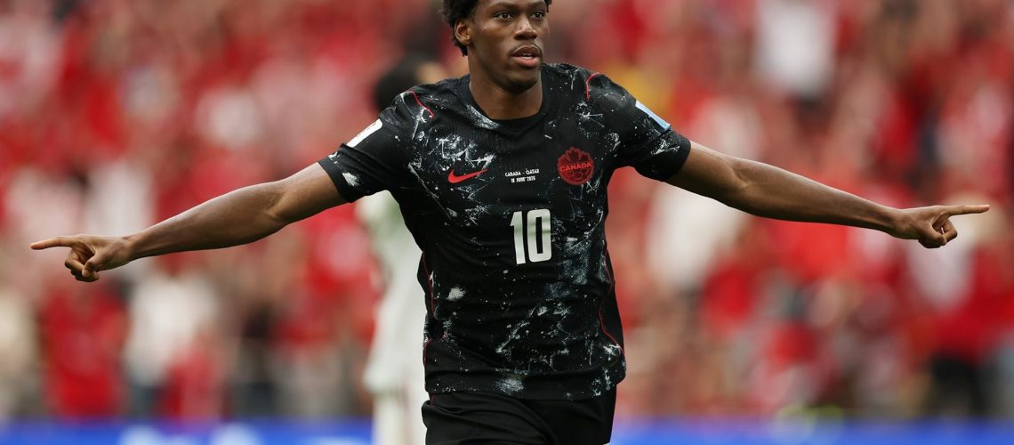 Jonathan David of Canada celebrates scoring his team's second goal during the FIFA World Cup 2026 Group B match between Canada and Qatar at BC Place Vancouver.