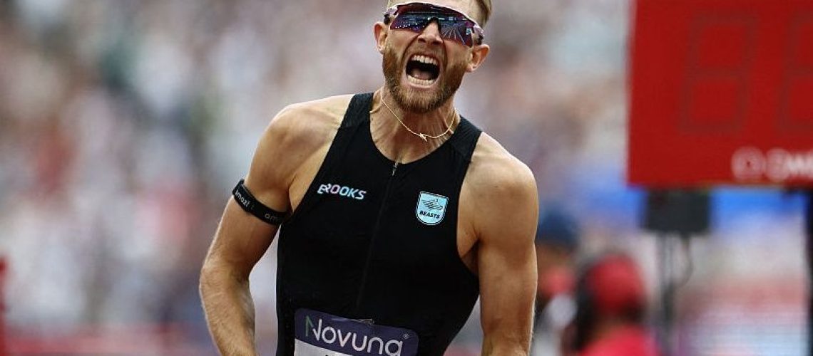 Britain's Josh Kerr celebrates after winning the men's one mile event during the IAAF Diamond League athletics competition at the London stadium in London on July 18, 2026.
