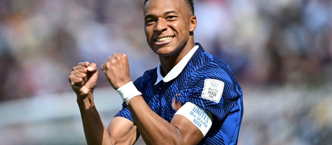 EAST RUTHERFORD, NEW JERSEY - JUNE 16: Kylian Mbappe #10 of France celebrates scoring his team's first goal during the FIFA World Cup 2026 Group I match between France and Senegal at New York New Jersey Stadium on June 16, 2026 in East Rutherford, New Jersey. (Photo by Shaun Botterill - FIFA/FIFA via Getty Images)
